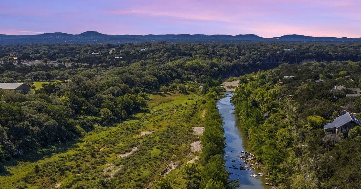 A river valley in the Hill Country at dusk